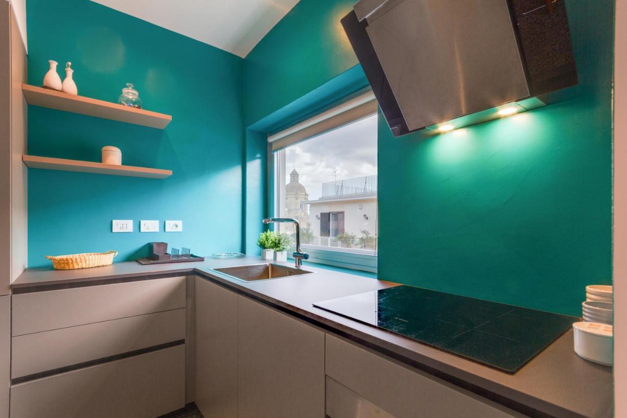 Inner City Apartments Lecce Bagian luar foto